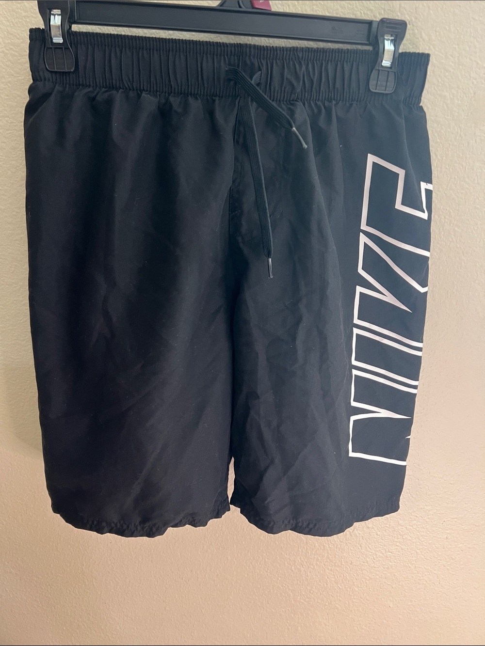 Nike Black Swim Trunks with White Side Logo Outline
